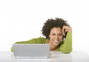 Africian American Woman on White Seamless with laptop