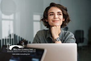 woman sitting in office, smiling
