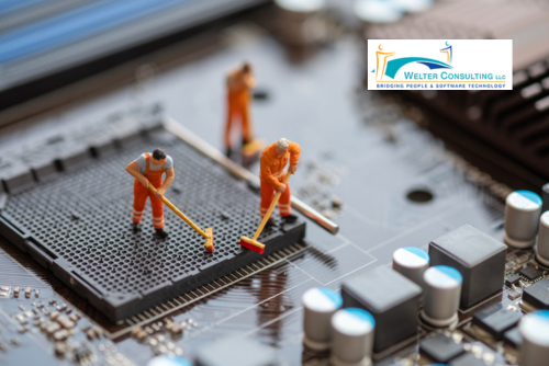 mini-people scrubbing the inside of a computer