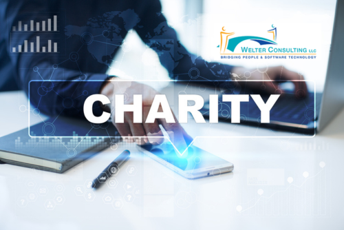 person at computer with mobile devices and large CHARITY overlay. Multi-State Charitable Solicitations